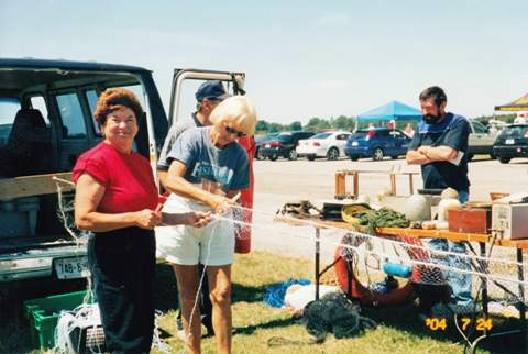 Janice Case nee Chalmers, Joan Bastien nee Siddall, Jim Dickhout in background Festival of History July 24, 2004